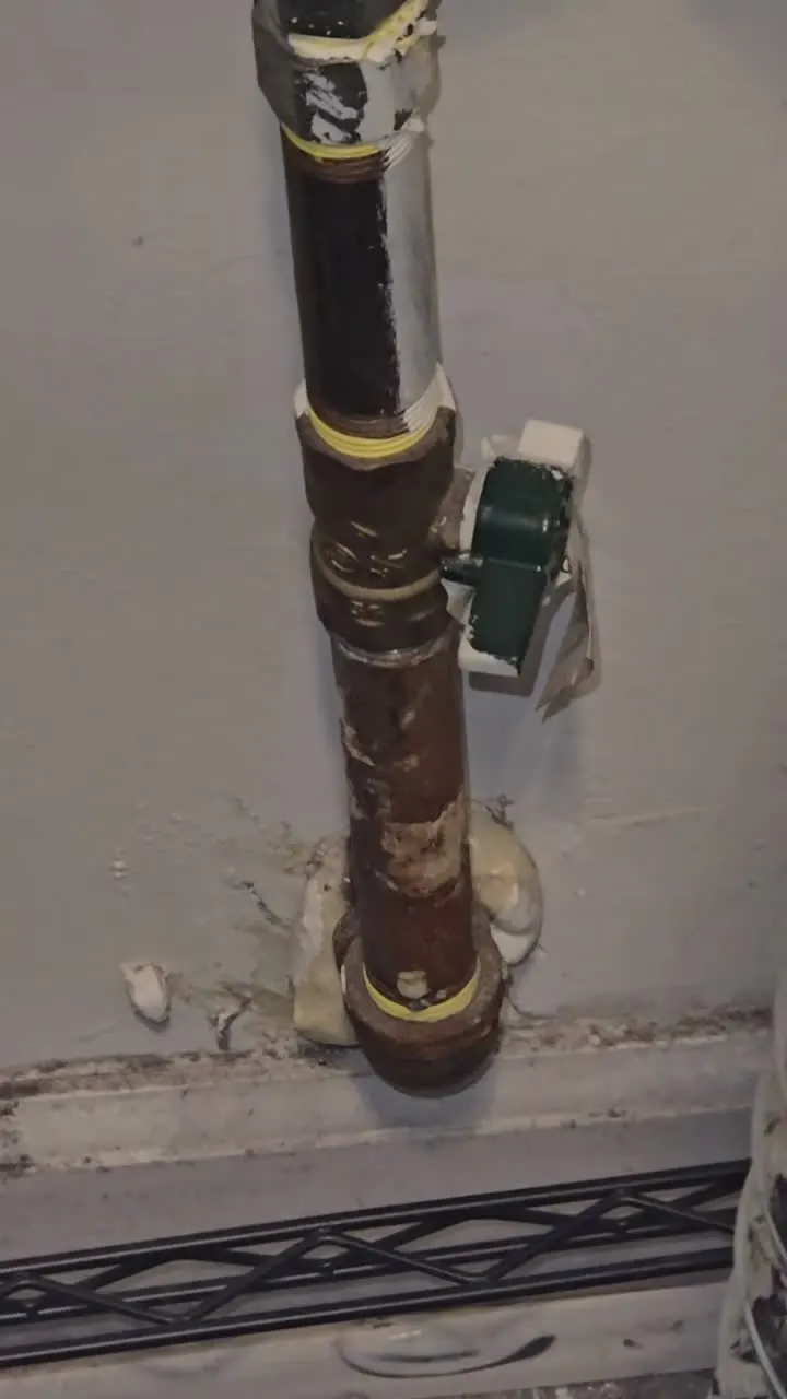 Gas supply pipe and shutoff valve behind an LG dryer